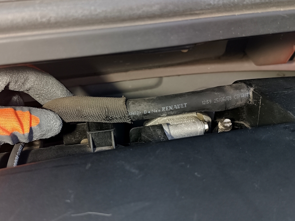 Clip the hose onto the air filter box