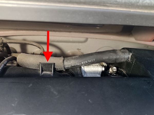 Hose clipped onto the air filter box